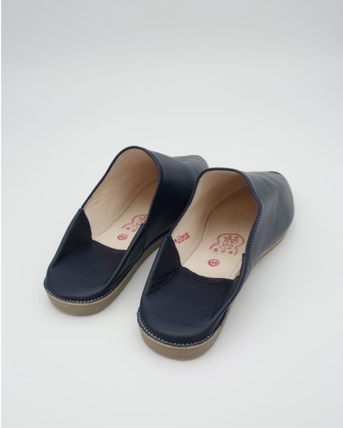 babouches homme matiere cuir de couleur bleues vue arriere-trois-quart