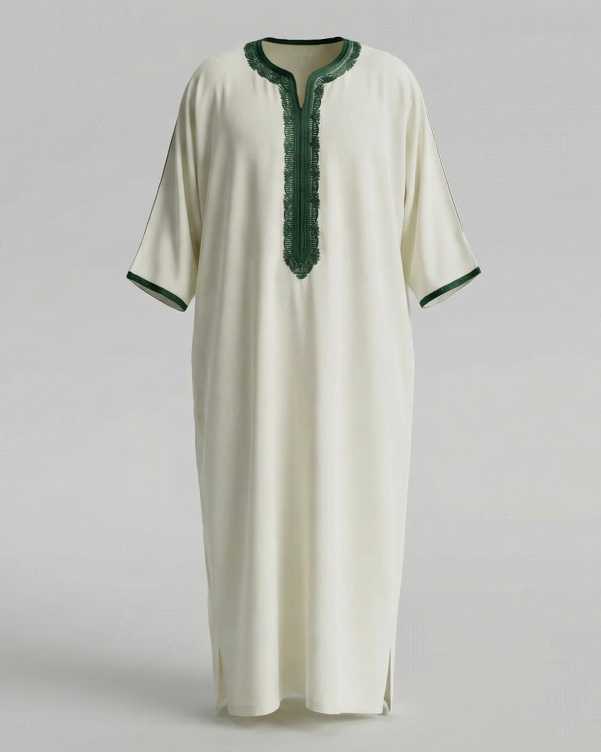 mannequin portant gandoura homme matiere gabardine de couleur blanc-et-vert avec un travail motifs traditionnels brodés vue entiere