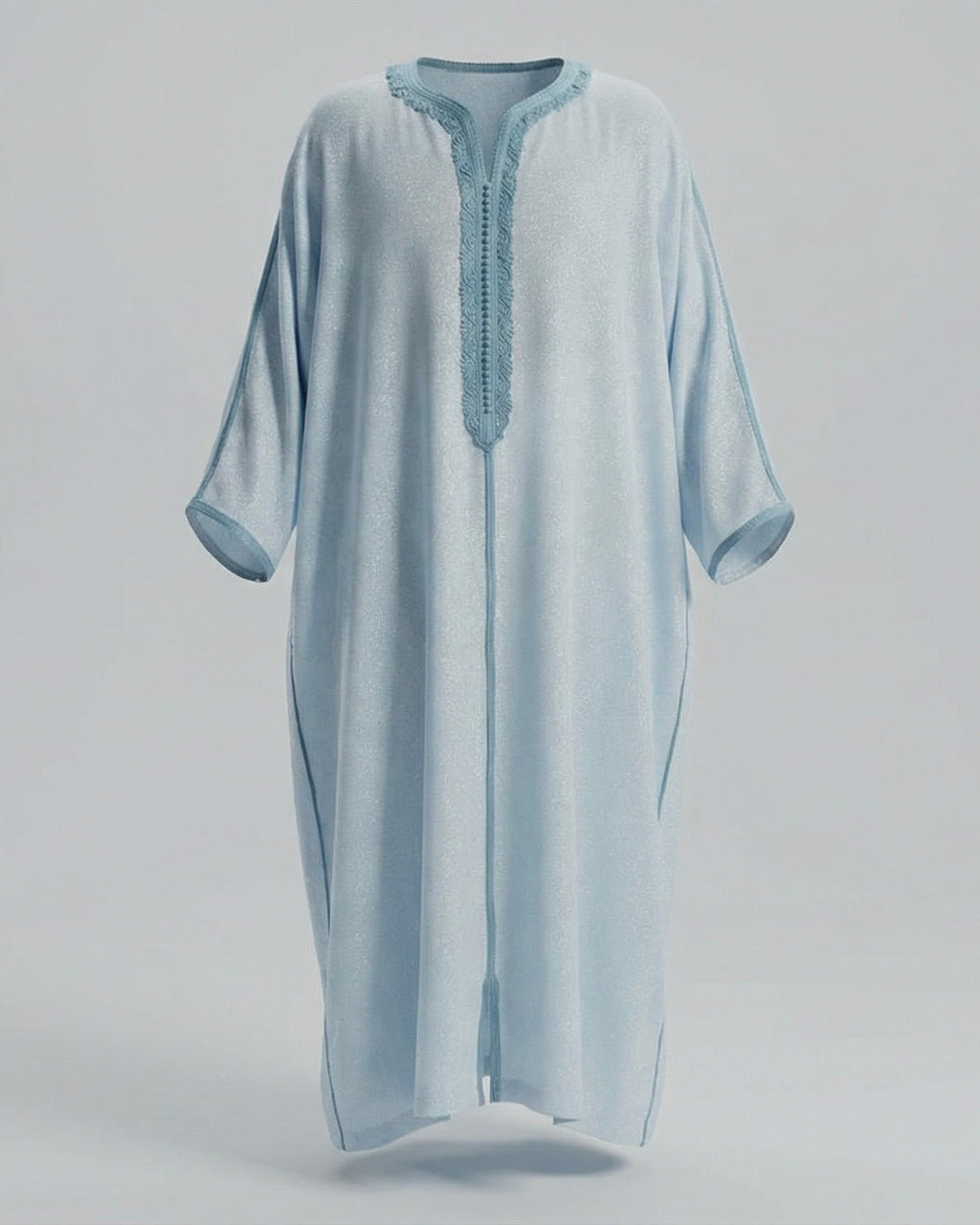 mannequin portant gandoura homme matiere lin de couleur bleu avec un travail motifs fait main vue entiere
