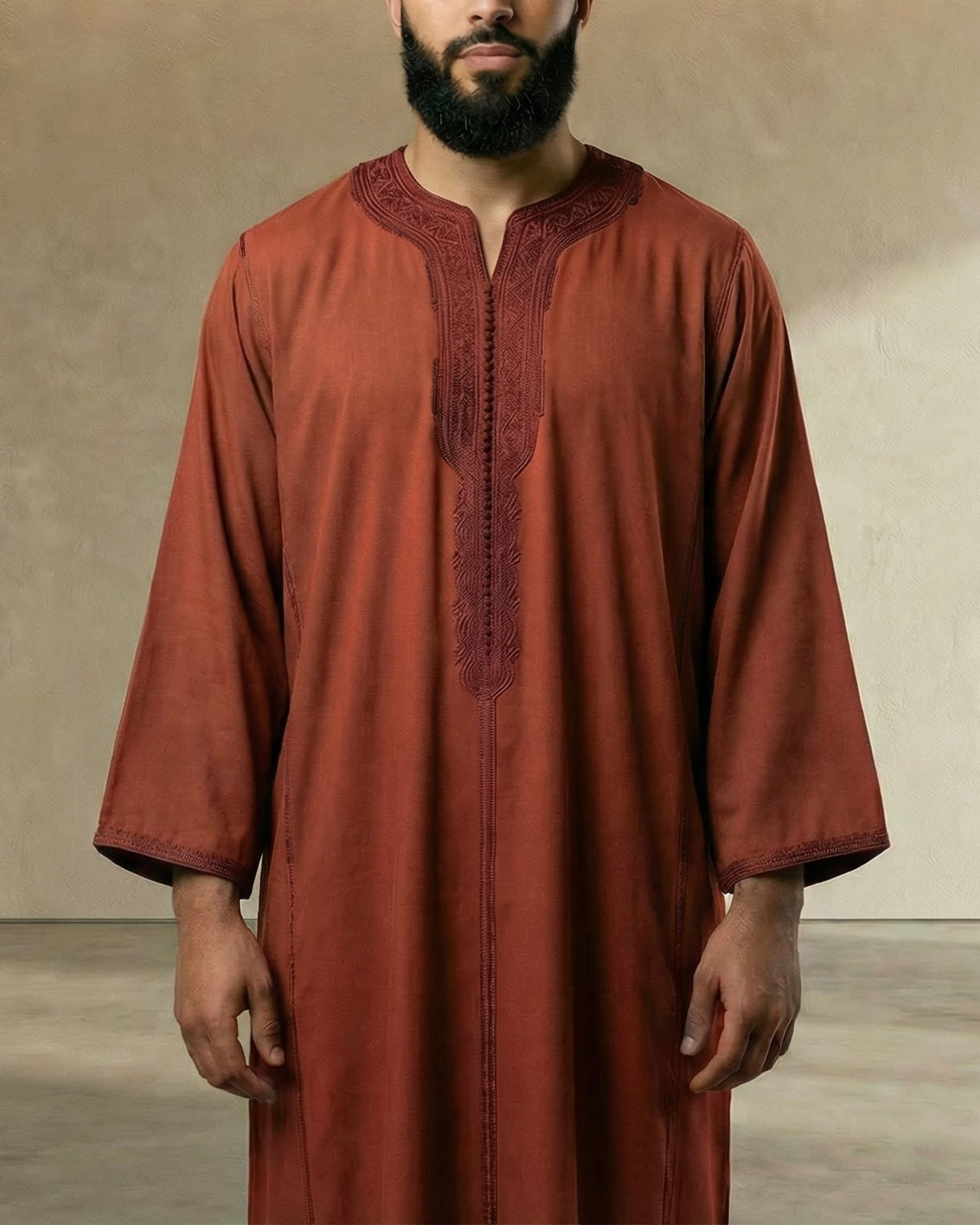 mannequin portant gandoura homme matiere mlifa de couleur rouge avec un travail motifs fait main vue face-rapprochee