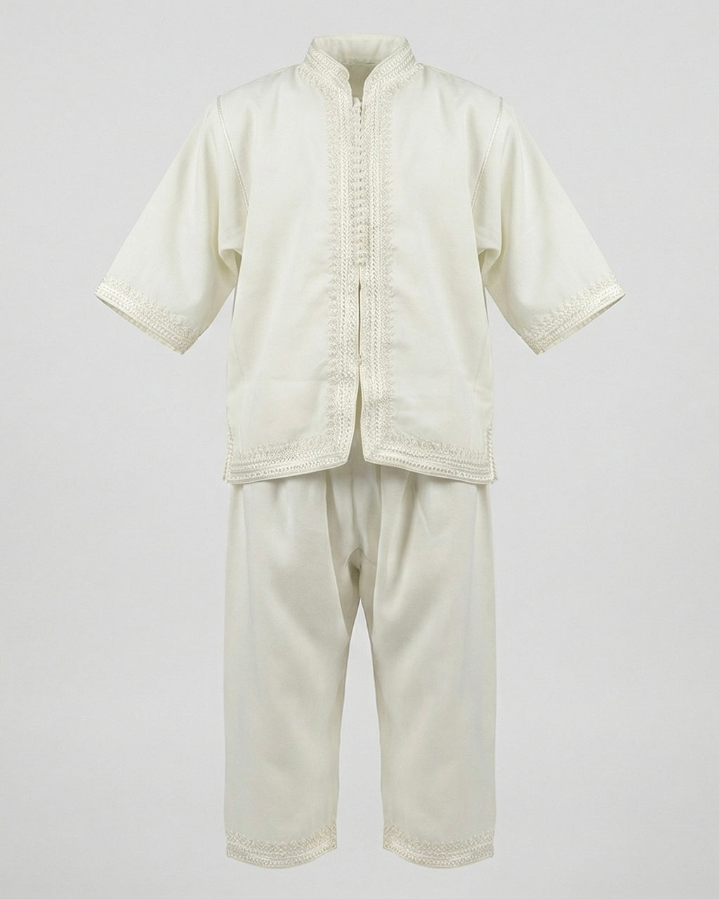 mannequin portant jabador enfant matiere trois-pieces de couleur blanc avec un travail finition faite main vue entiere