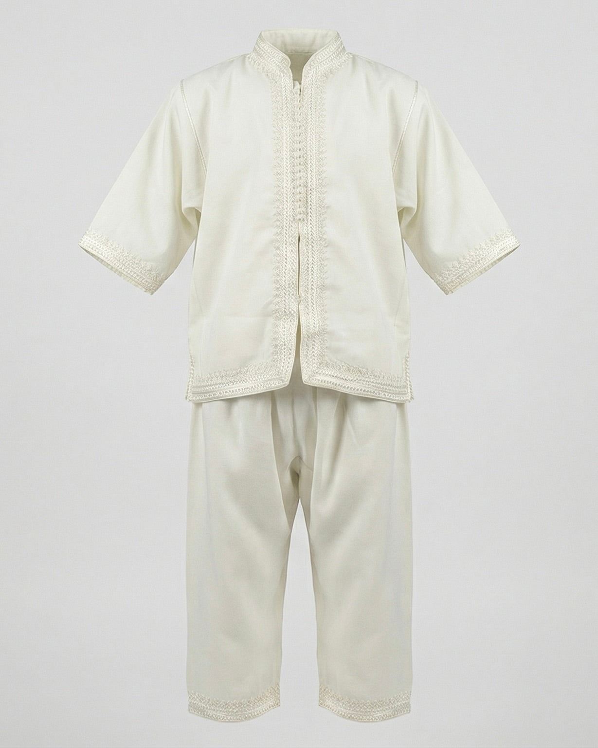 mannequin portant jabador enfant matiere trois-pieces de couleur blanc avec un travail finition faite main vue entiere